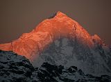 Gokyo Ri 07-3 Makalu Close Up From Gokyo Ri At Sunset The Makalu West Face changes from white to yellow to orange to a soft red in the last rays of the sun from Gokyo Ri.